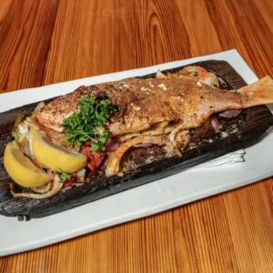 Sammy’s Famous Baked Whole Red Snapper (head on) at Sammy's Fish Box